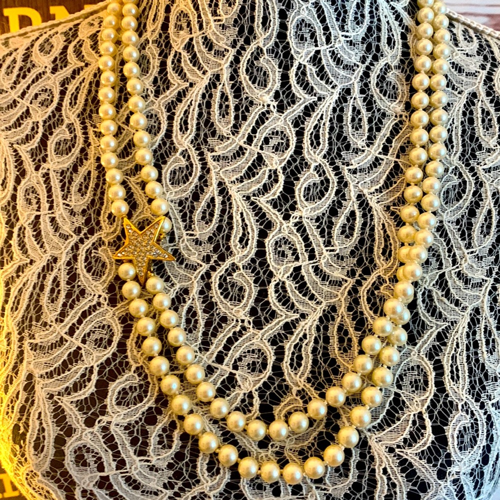 Vintage Joan Rivers, 30 inch ivory pearl necklace with rhinestones filled star